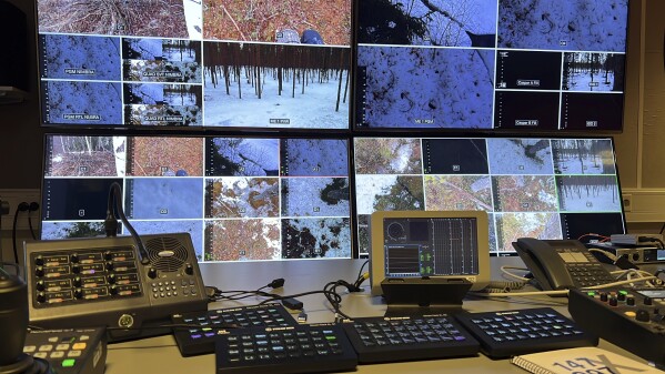 This undated photo, issued by SVT, shows preparations in Junsele, Sweden for the livestream 'The Great Moose Migration' to document the annual Moose migration near Kullberg in northern Sweden. (SVT via AP)